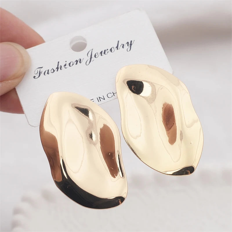 Unique Gold Ear-Shape Dangle Earrings