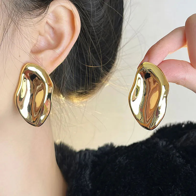 Unique Gold Ear-Shape Dangle Earrings